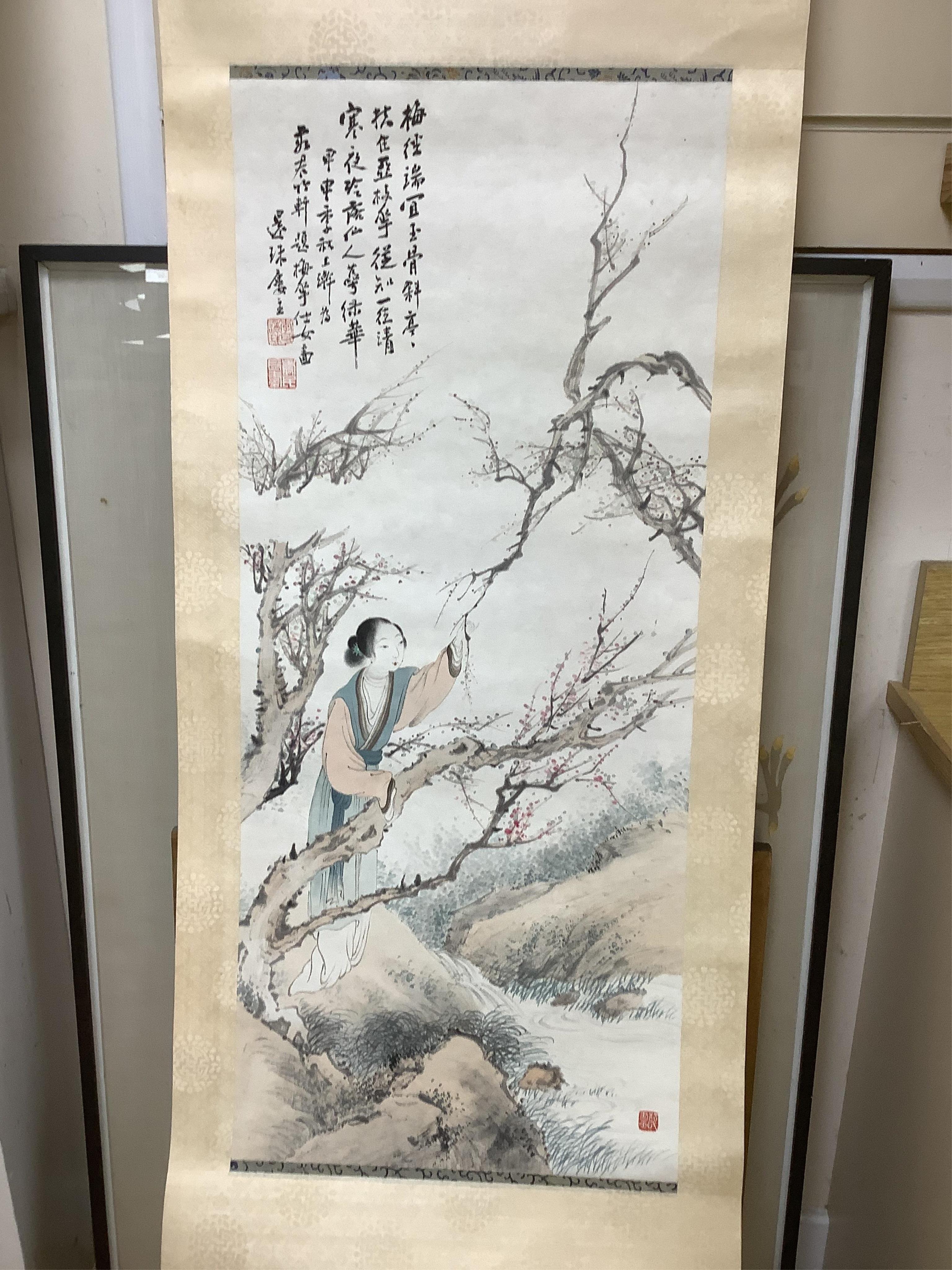 A set of four Chinese scroll paintings of ladies before landscapes, 48cm wide. Condition - fair